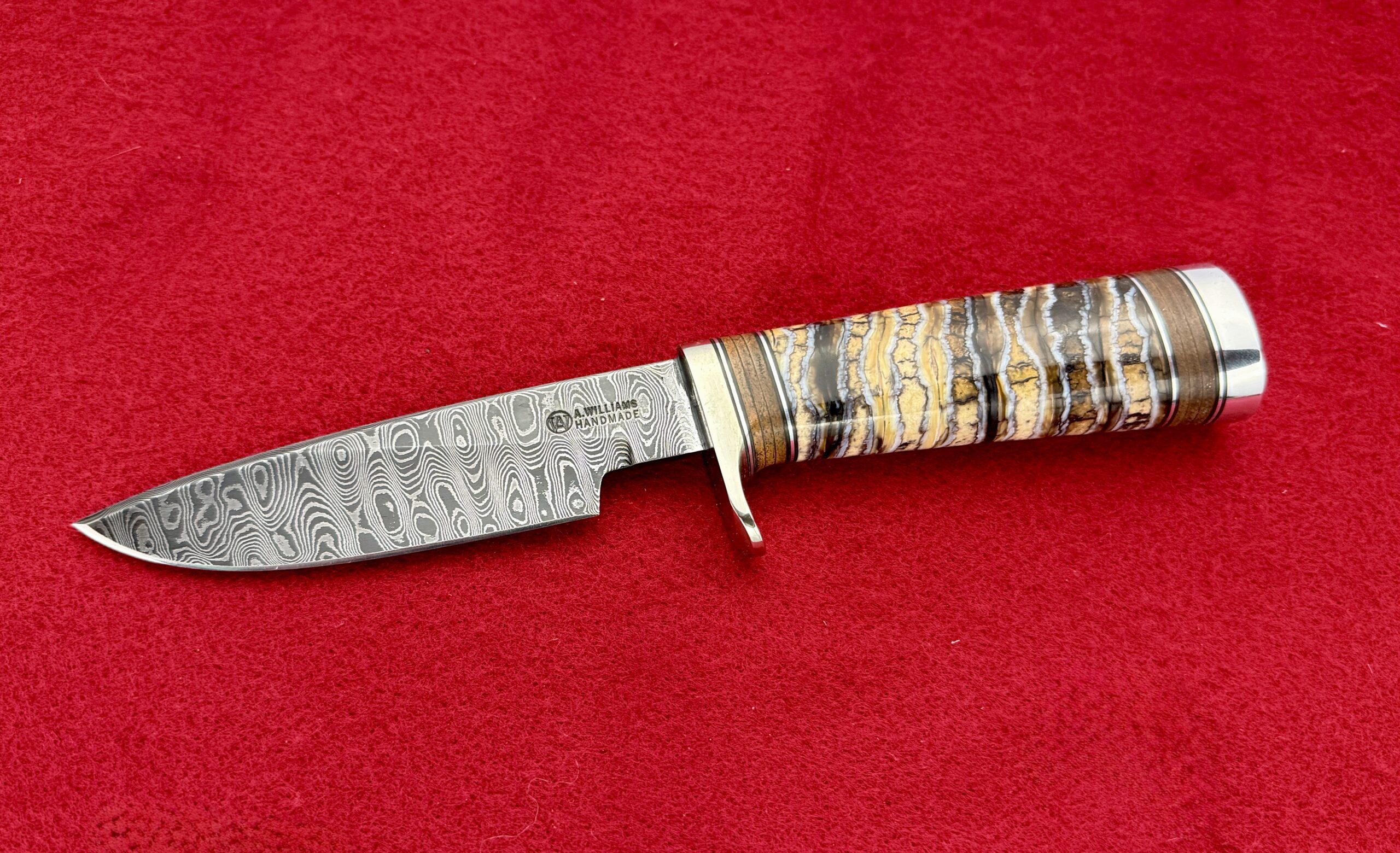 Damascus Randall style 25 with Woolly Mammoth tooth